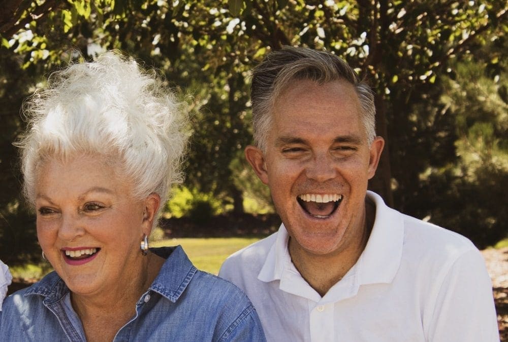 retired couple laughing