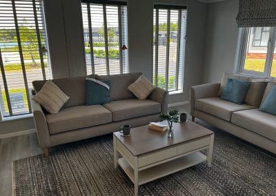 Living room, sofas, coffee table.