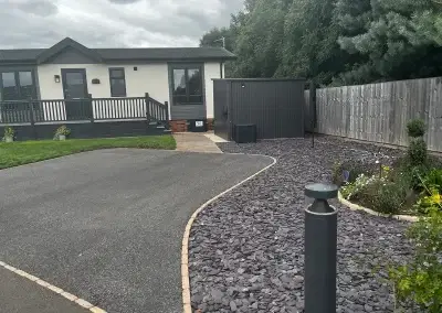 Charming residential park home with landscaped garden and parking area at Gateforth Park