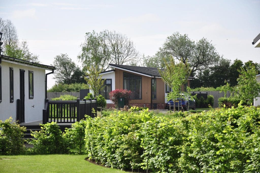 Residential park with homes and lots of greenery