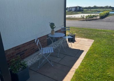 Relaxing outdoor seating area with a view of the surrounding landscape at Gateforth Park
