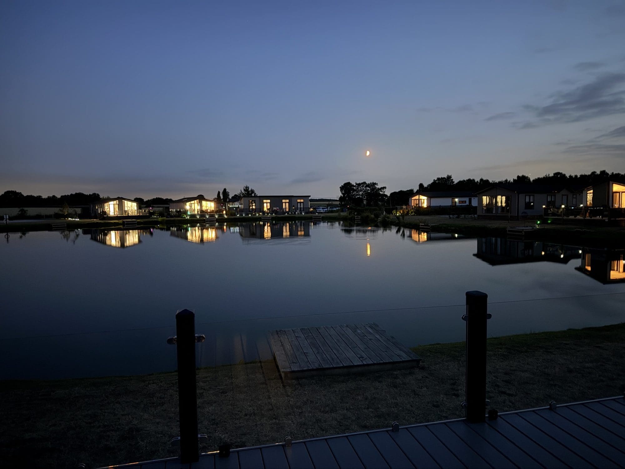 Lakeside view during the evening with stars and night sky